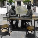 Statue Of Men Playing Cards
